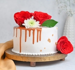 Round Drooling Vanilla Rose Cake